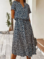 Florine | luchtige midi jurk elegante pasvorm strik