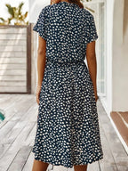Florine | luchtige midi jurk elegante pasvorm strik