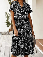 Florine | luchtige midi jurk elegante pasvorm strik