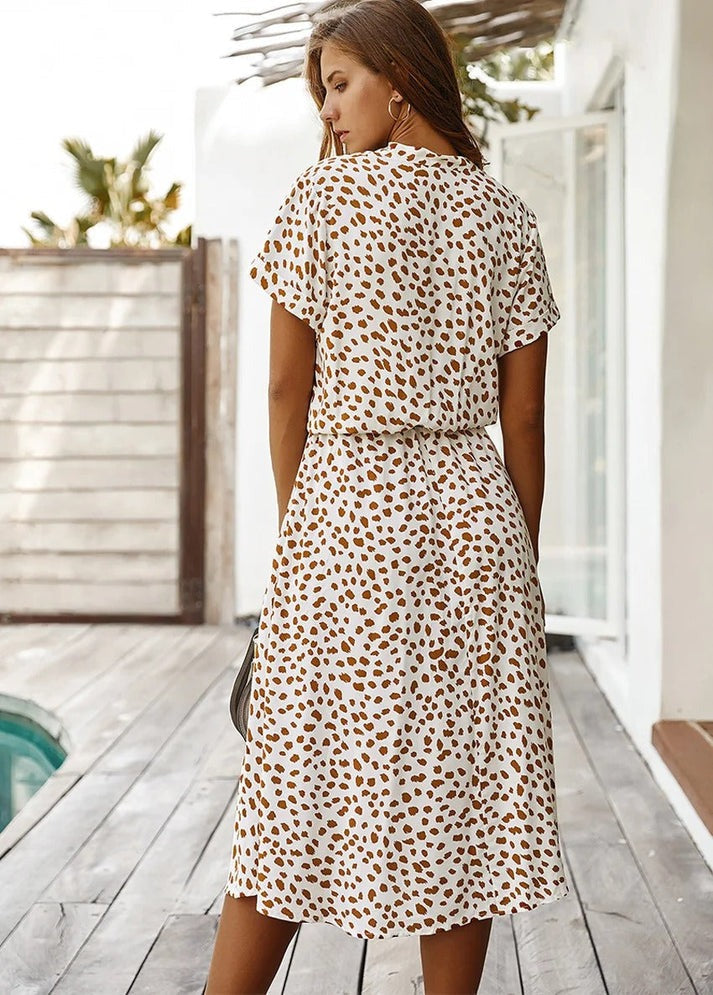 Florine | luchtige midi jurk elegante pasvorm strik