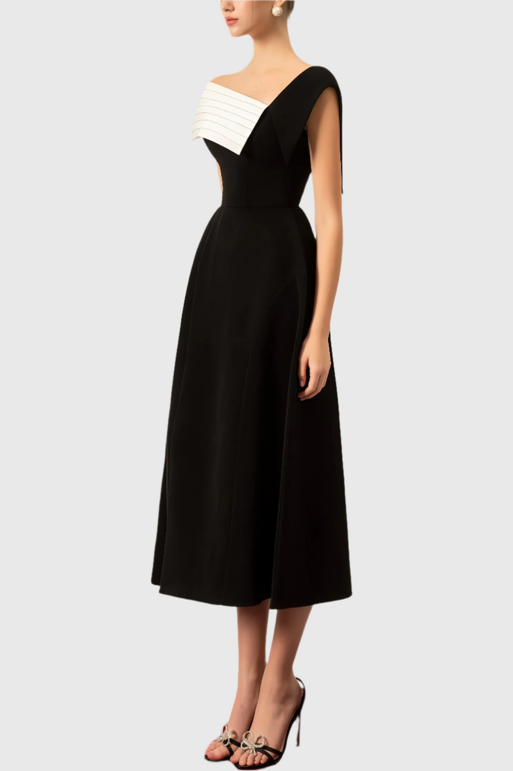 Liv | zwart-witte midi jurk één schouder elegant