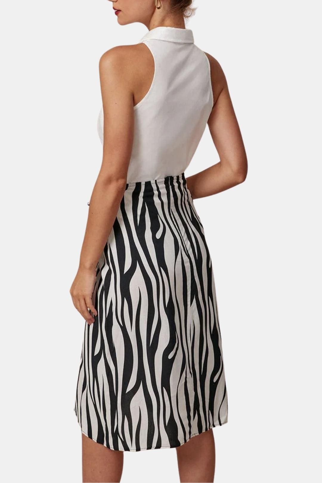 Evadne | Chic mouwloze blouse dames top halter klassiek